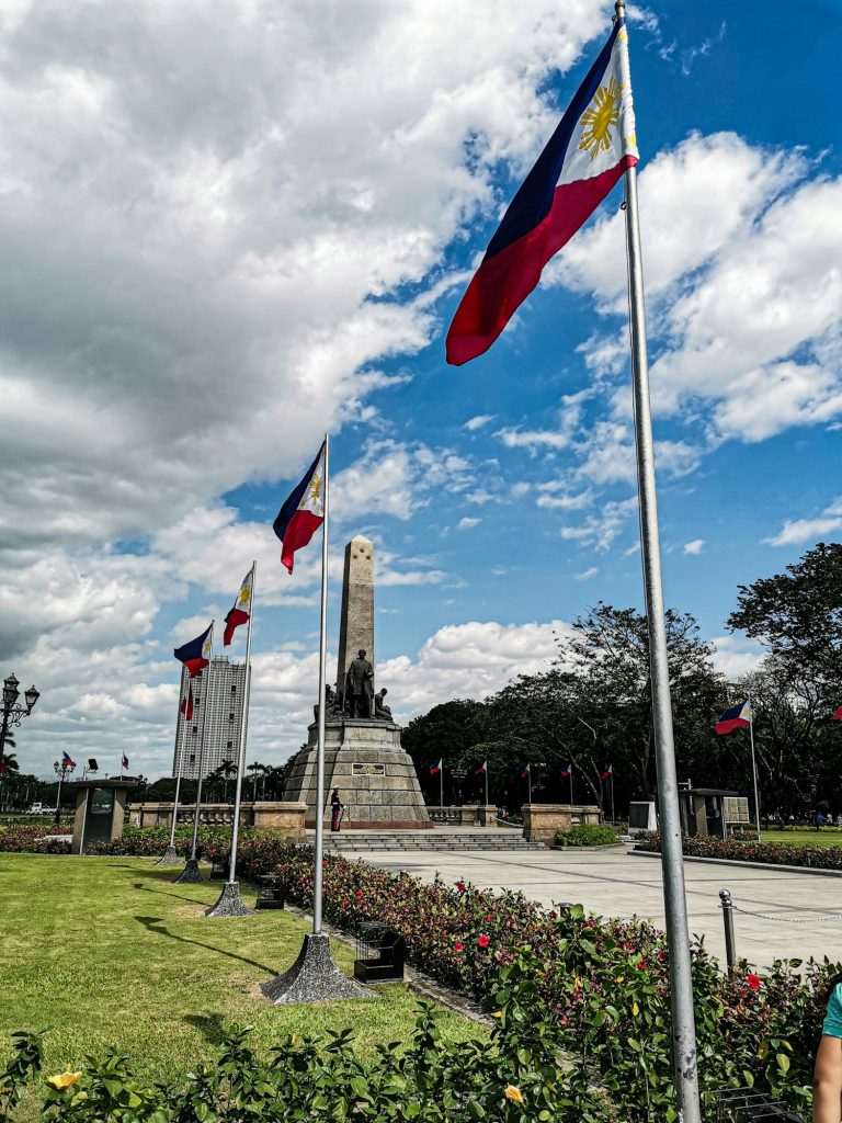 Vertical shot of the Rizal monument at the Rizal (Luneta Park) in Manila, Philippines